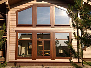 Деревянные окна для дома из бруса - фото 2